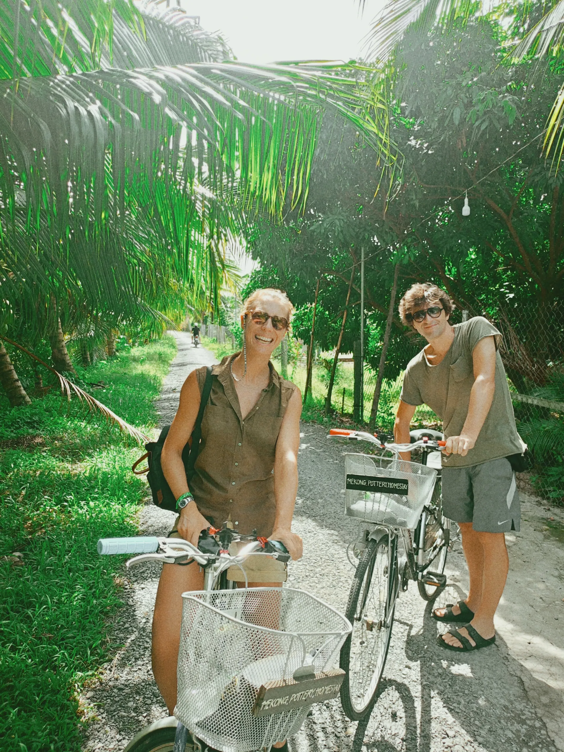 Cycling under coconut palms in Vinh Long