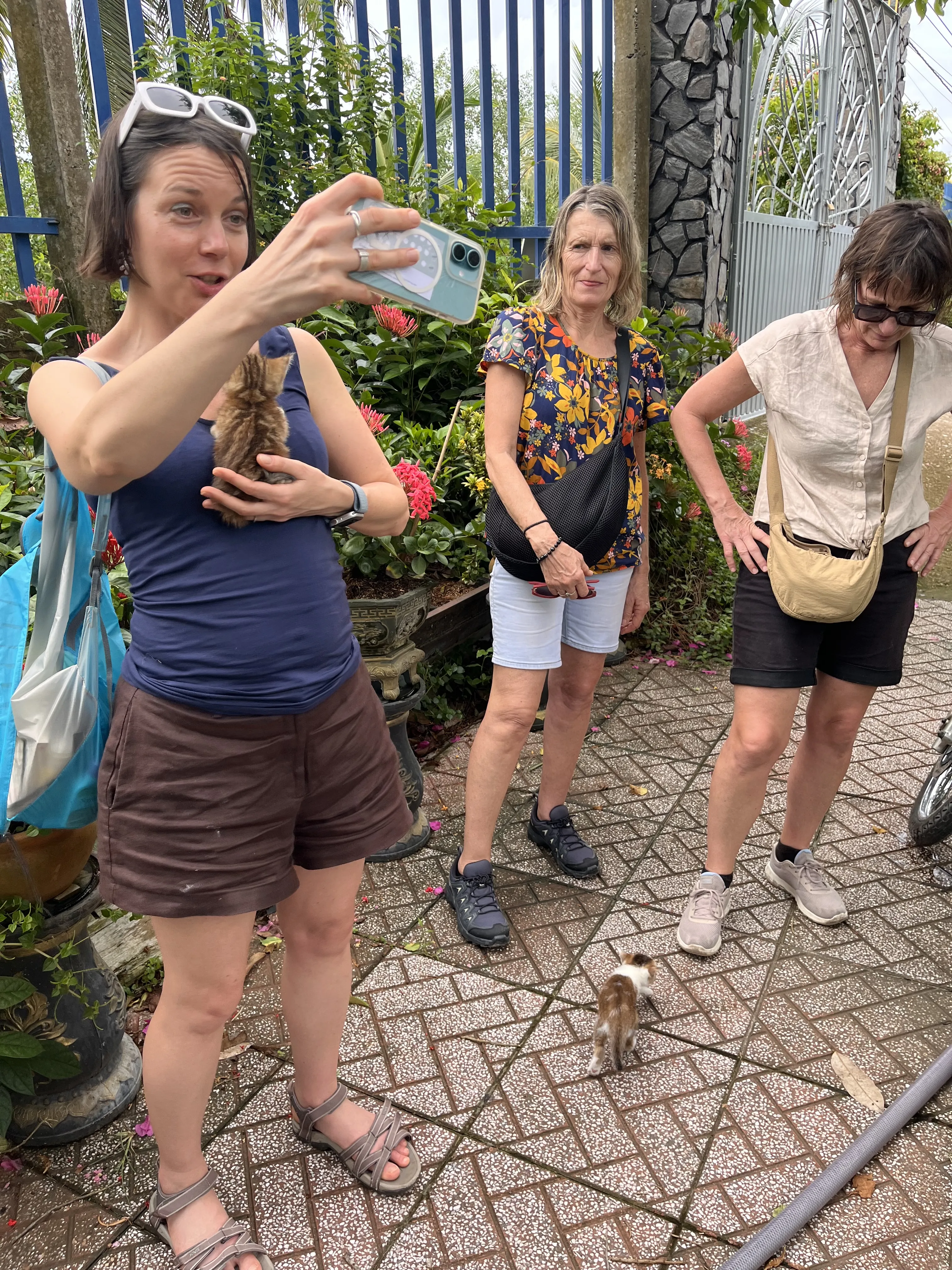 Visitors relaxing at a garden in Vinh Long countryside