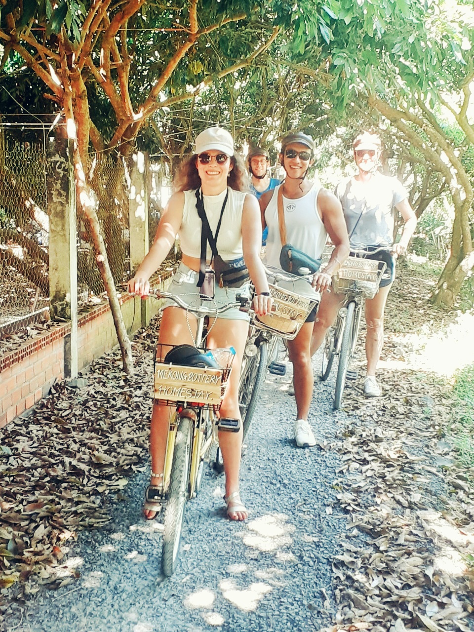 Group biking on village paths