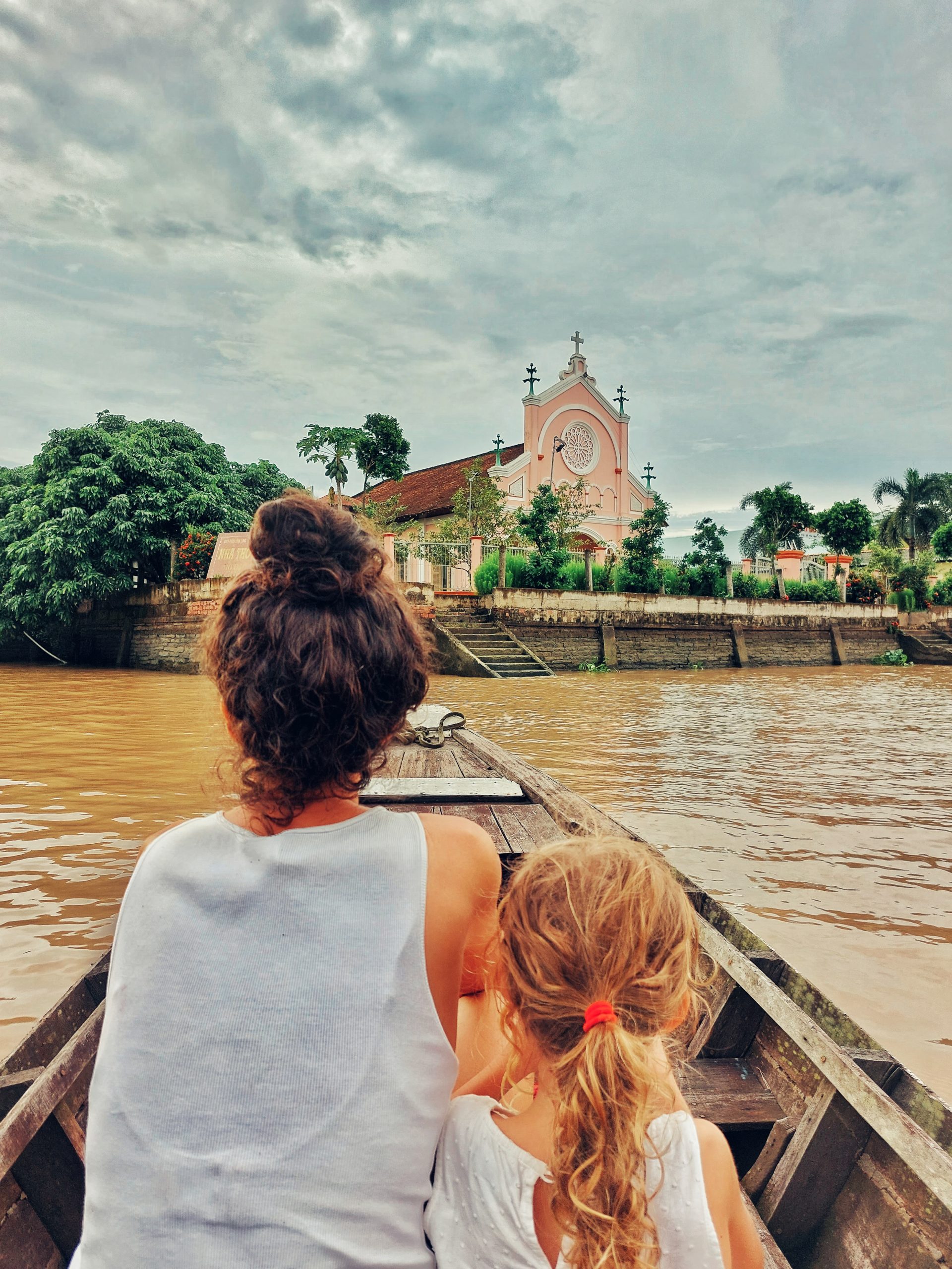 Approaching church by canoe