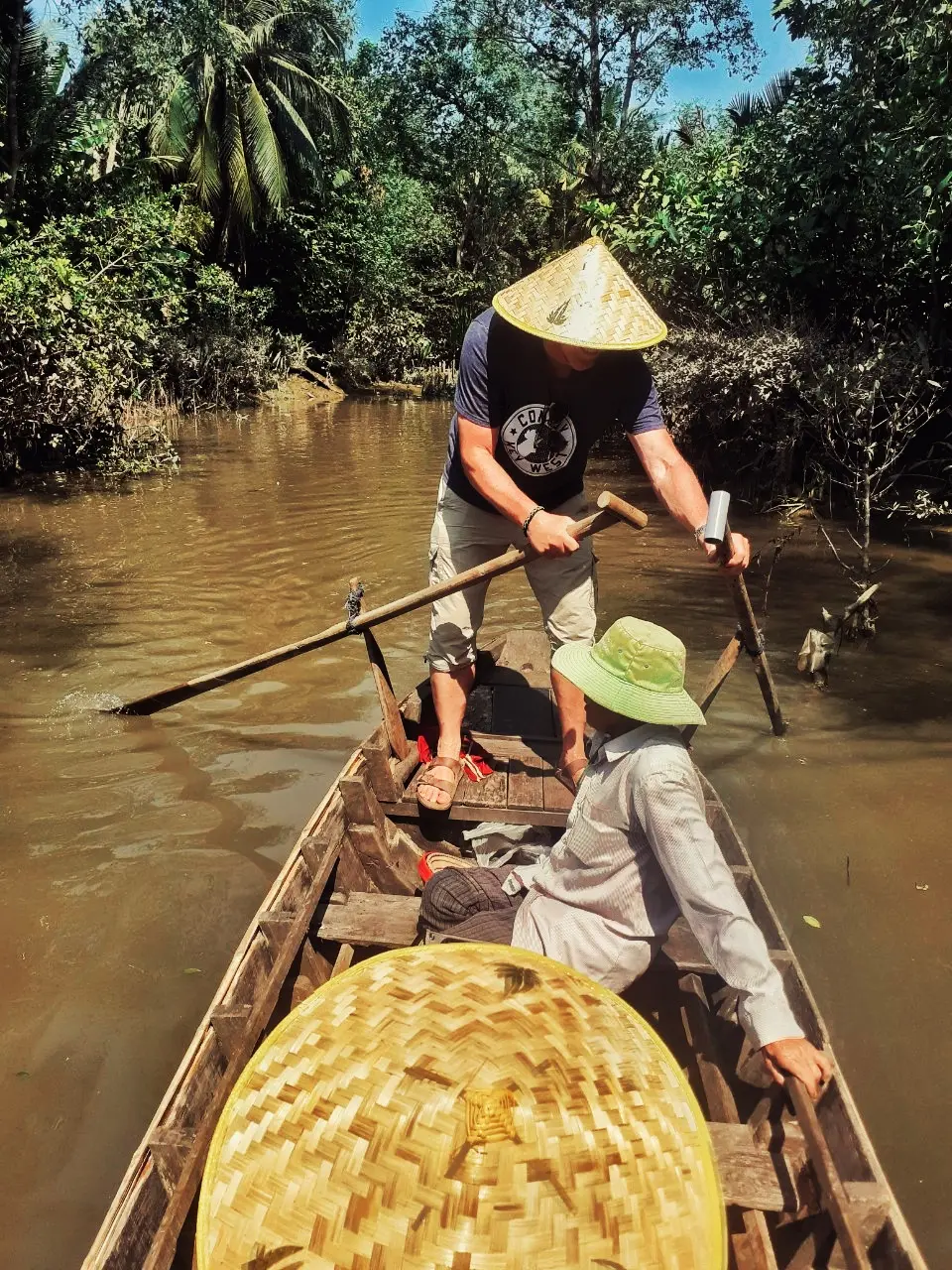 Canoe with conical hats