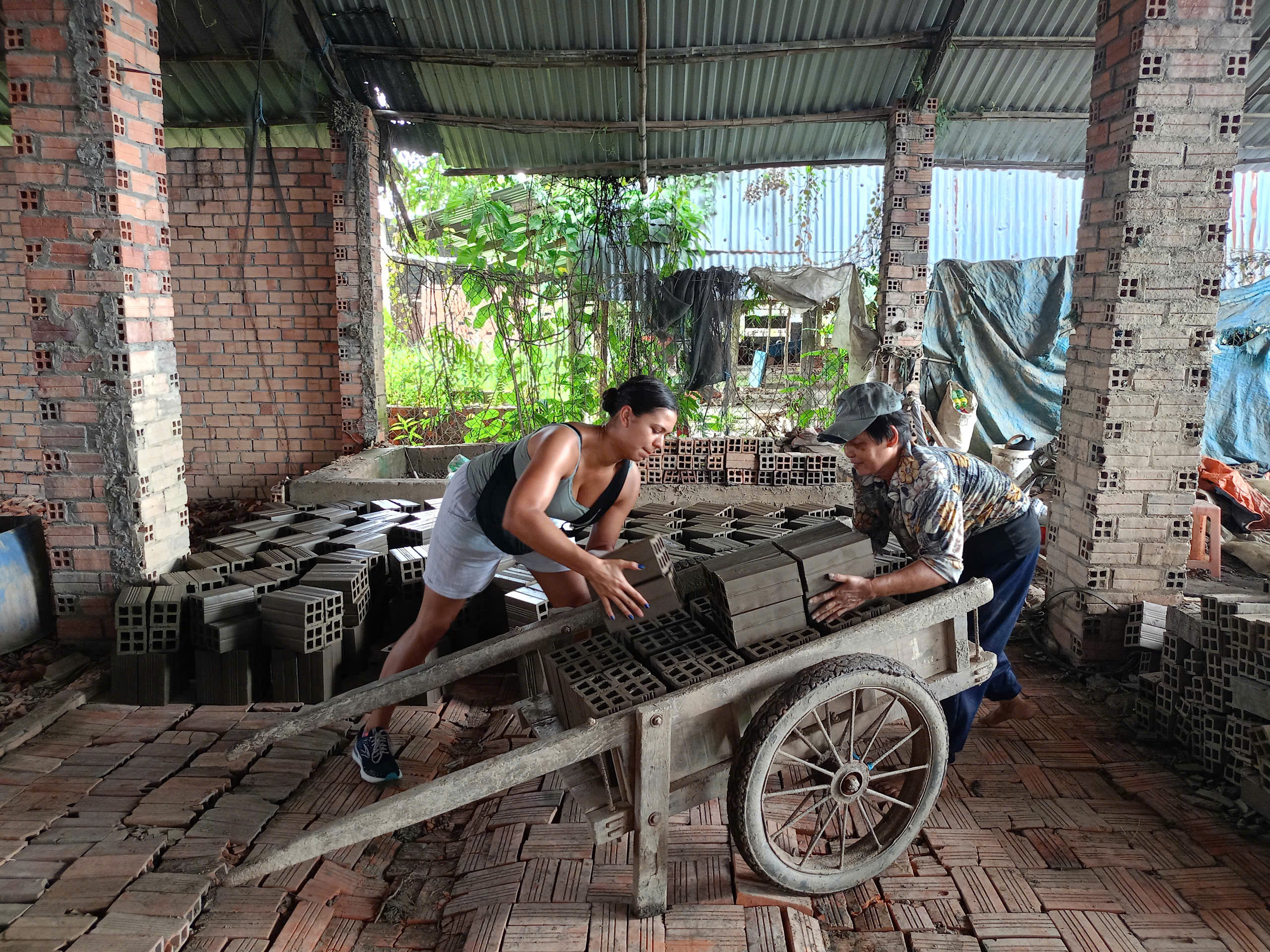 Cart with freshly made bricks
