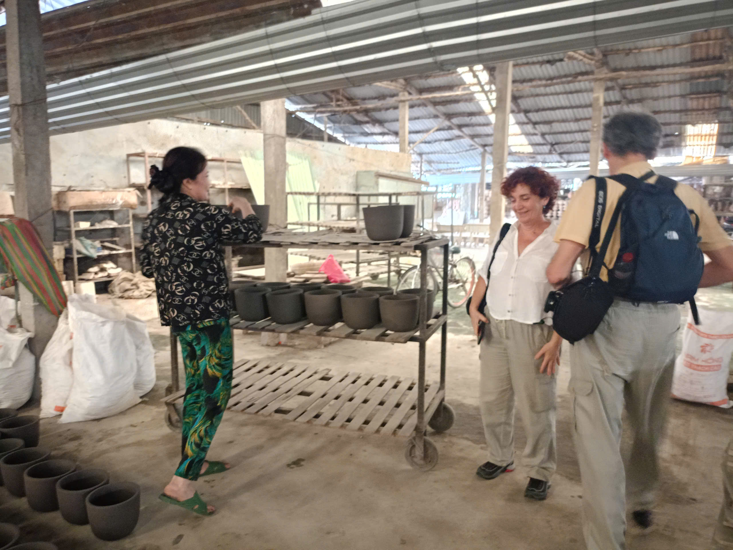 Factory workers collaborating