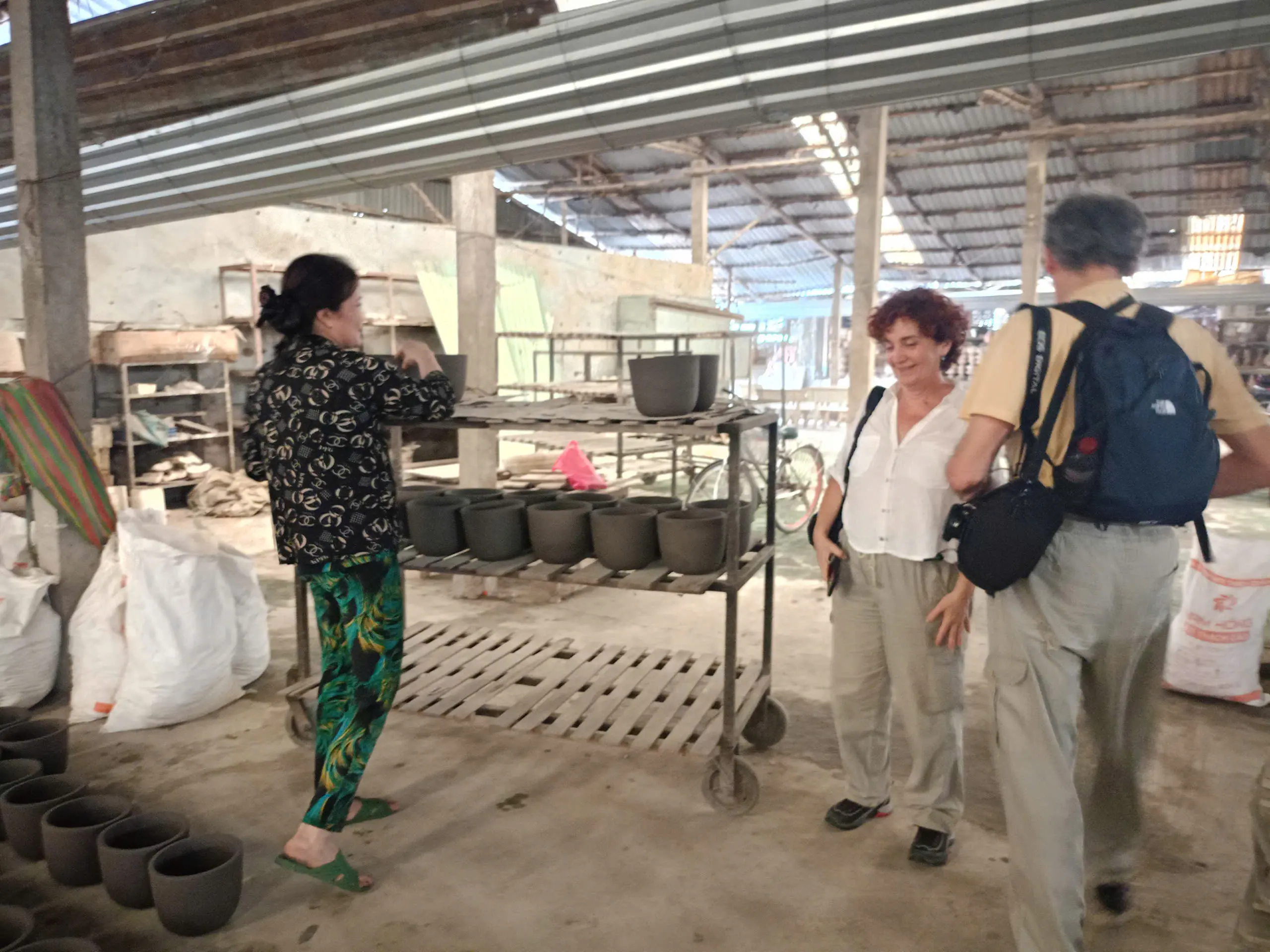 Factory workers collaborating