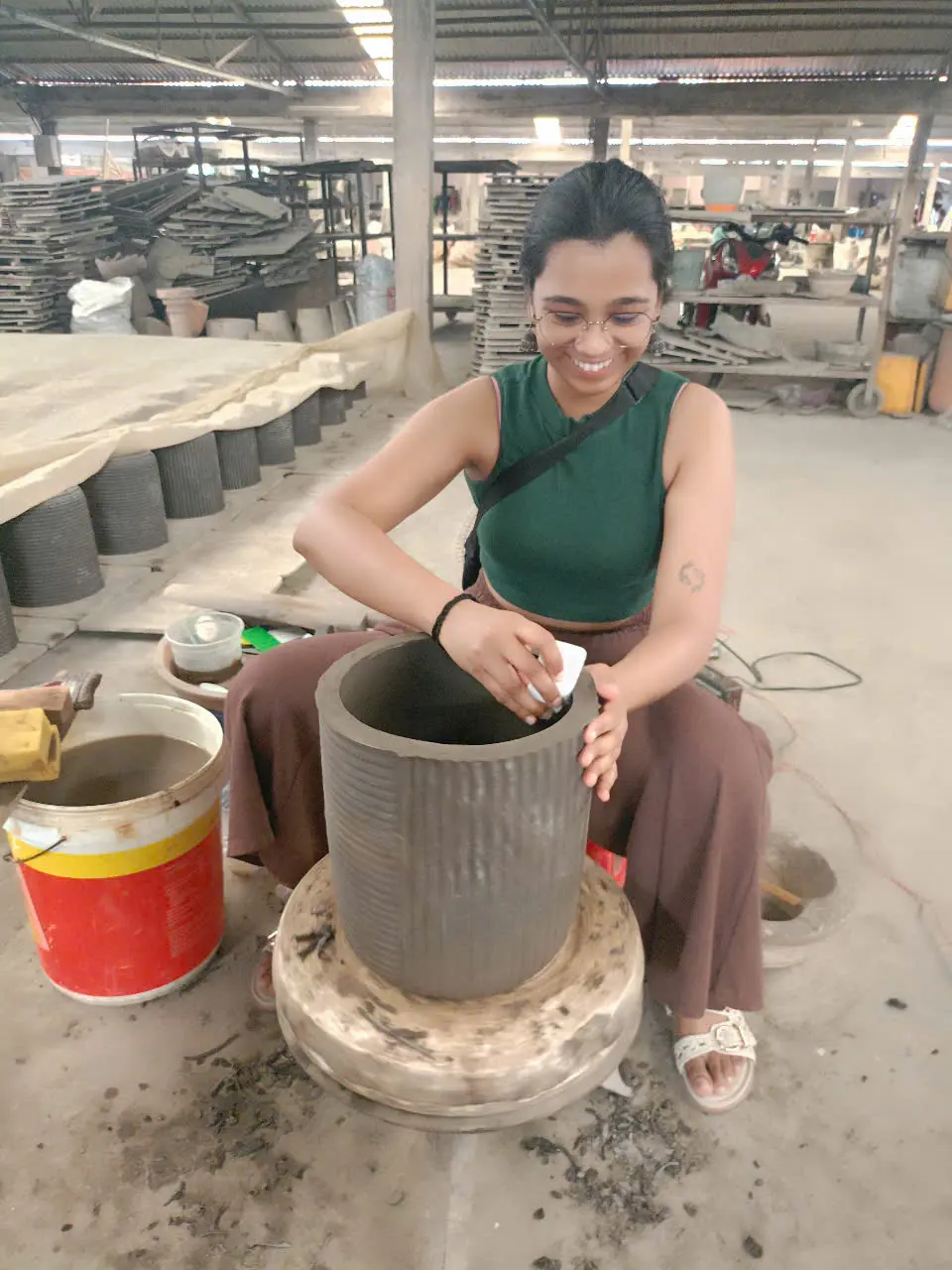 Female artisan on pottery wheel