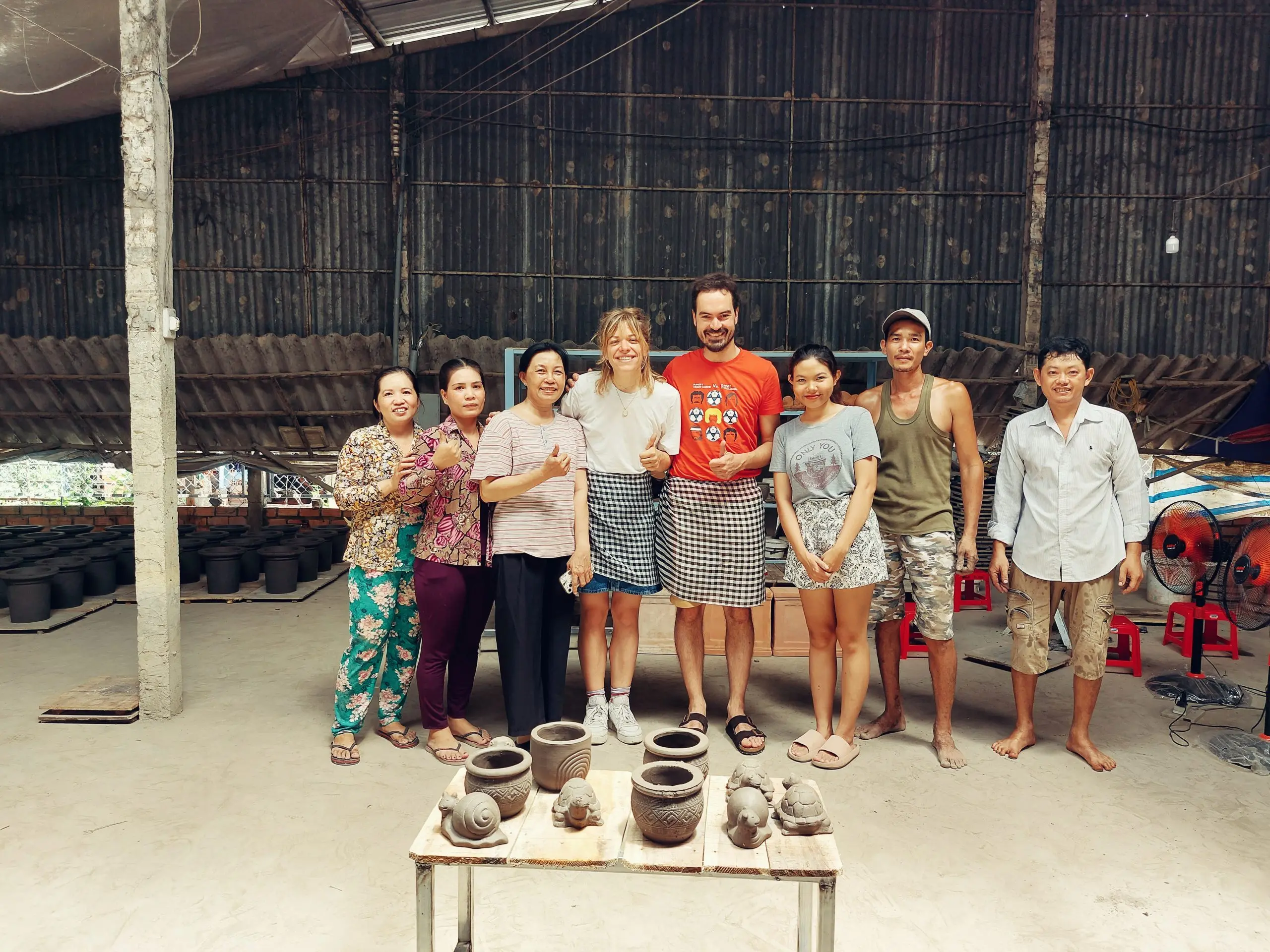 Working on large pottery pieces