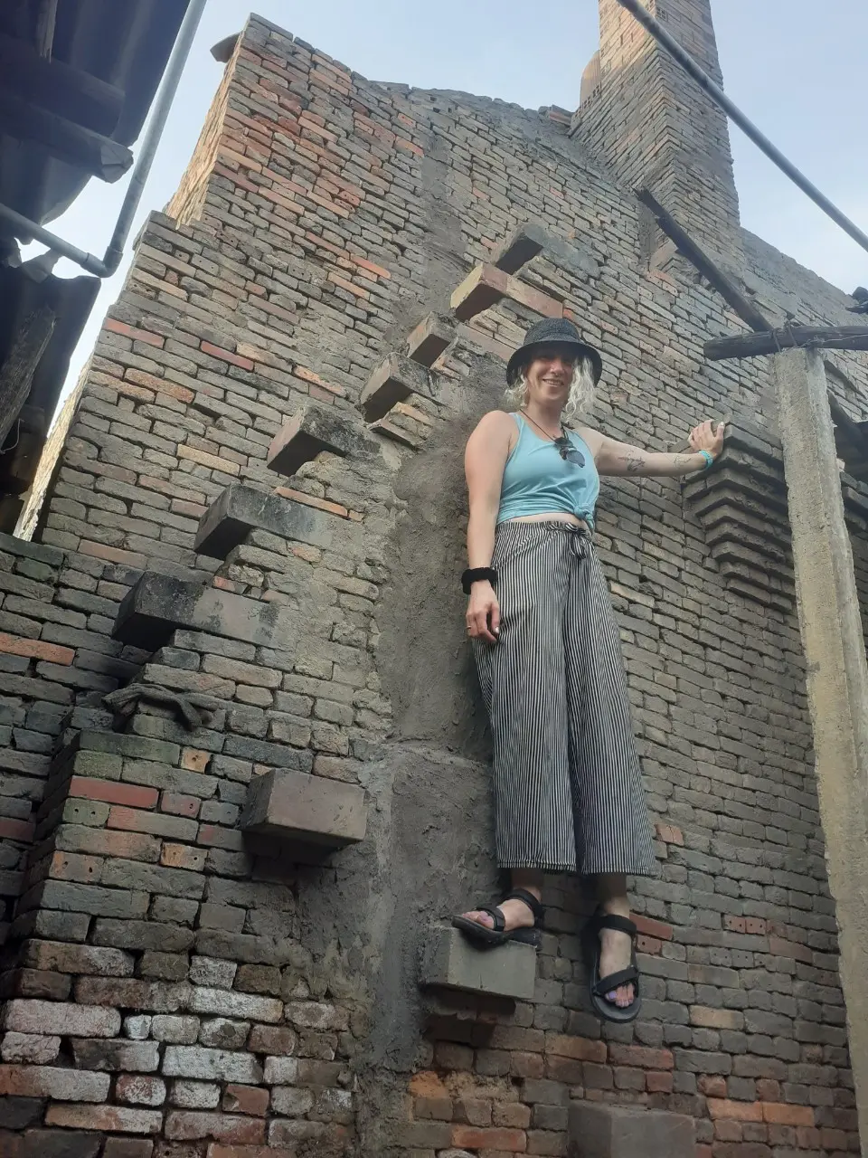 Tourist exploring brick kiln