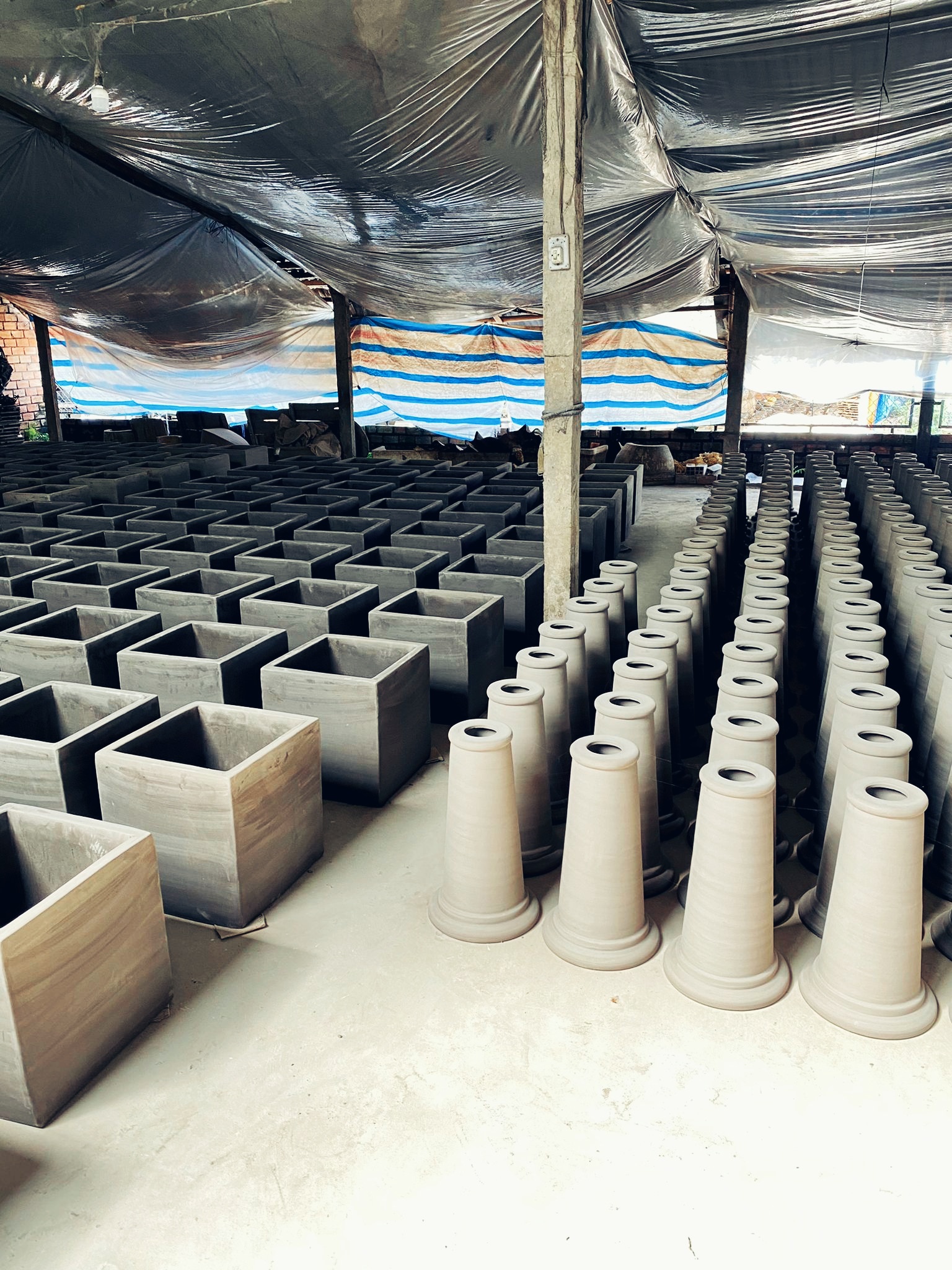 Rows of drying pottery